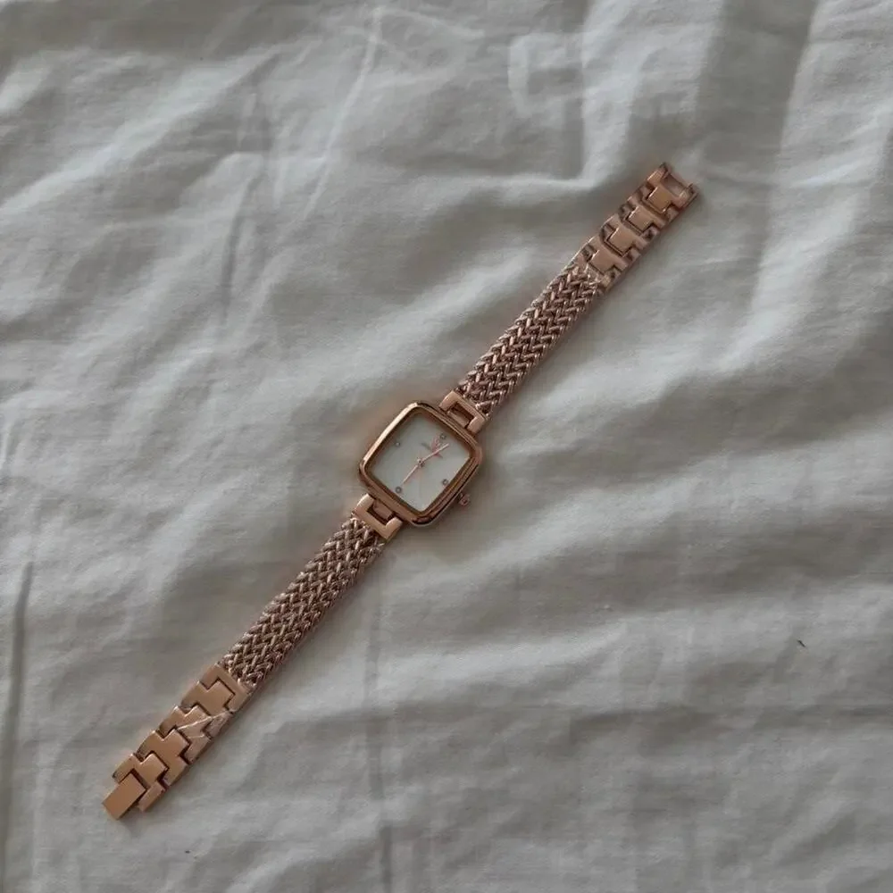 Rose gold watch with white